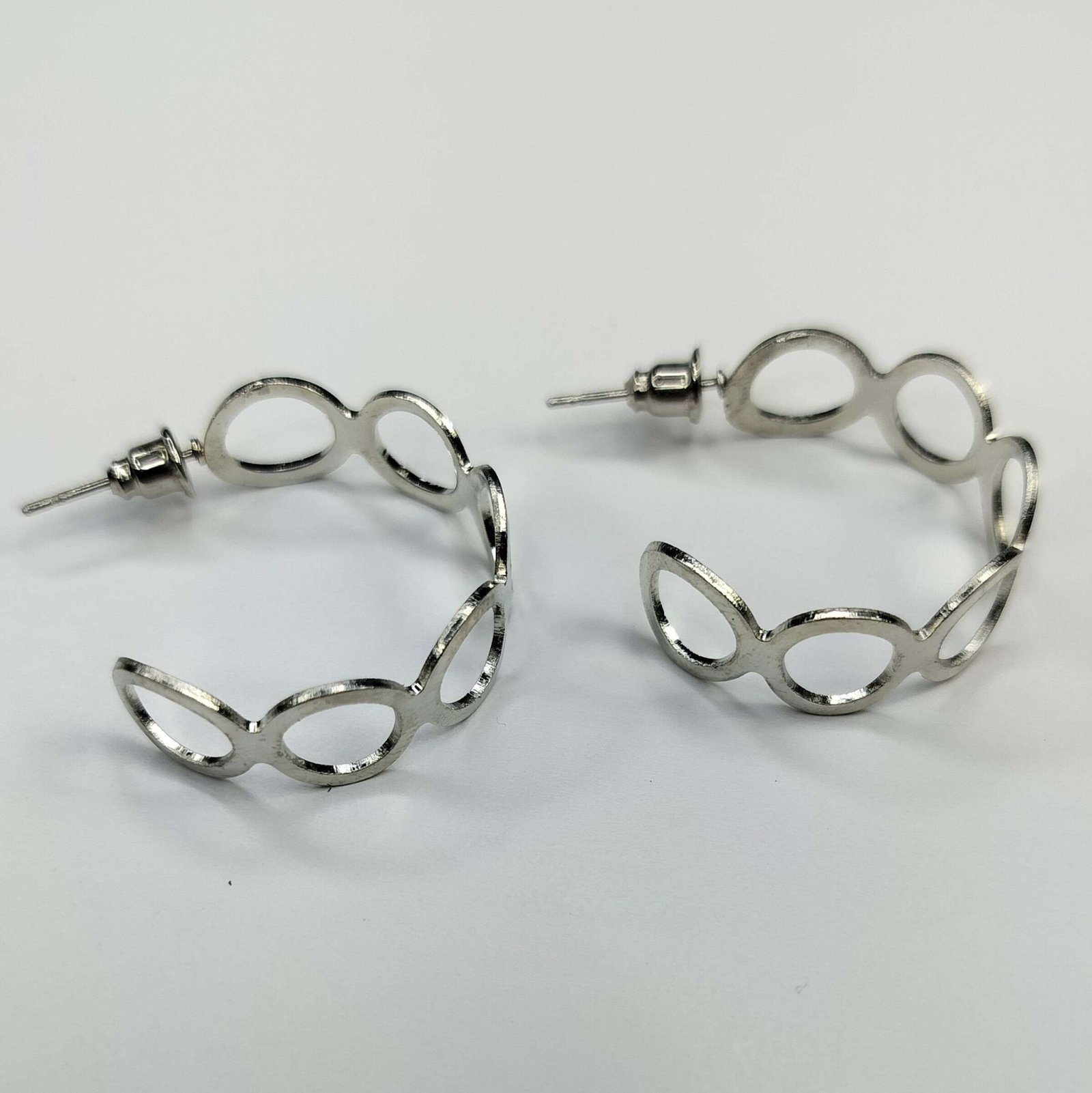 Twisted hoop earrings premium hoop luxury jewelry earrings silver hoop earrings, oxidized hoop earrings, Shree Pramukh Jewellery, elegant accessories, lightweight earrings, gift jewelry