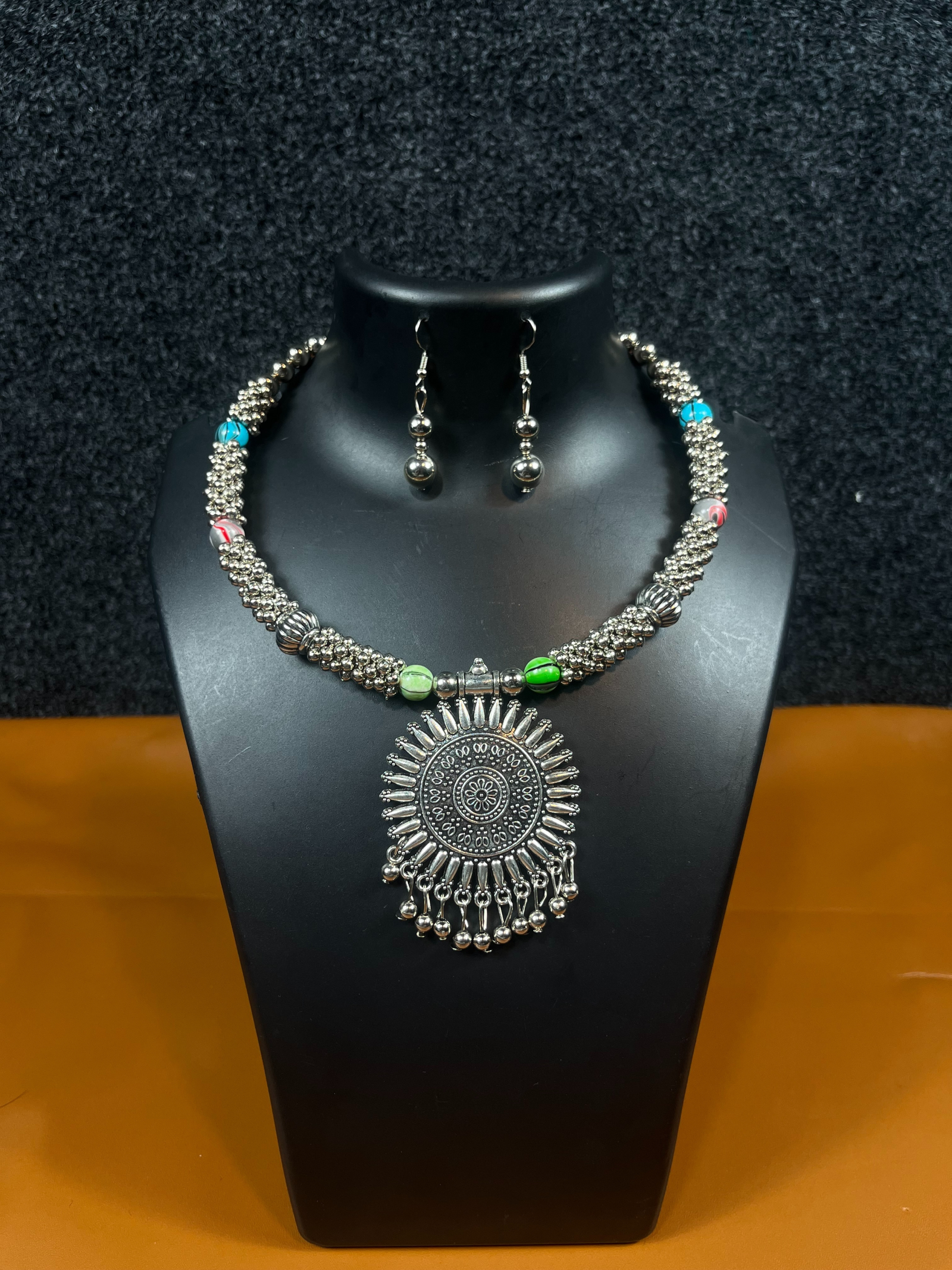 Explore the beautiful Navratri Oxidized Silver Necklace Set with Colorful Beads. Perfect for festive celebrations and traditional events. Shop now at Shree Pramukh Jewellery!